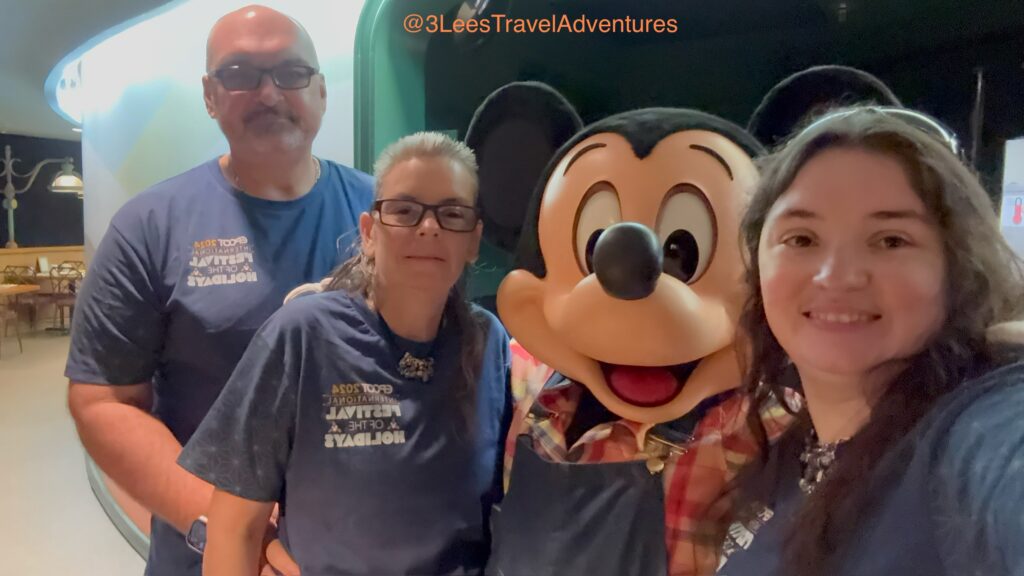 Farmer Mickey takes time out of his Garden to say Hello to Everyone at Garden Grill.