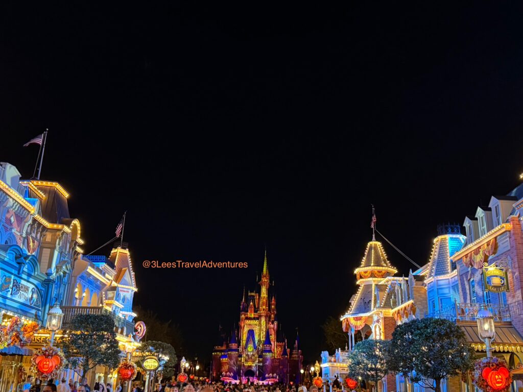Cinderella's Castle and Main Street, U.S.A. shining at the close of a Wonderful Mickey's Not-So-Scary Hlloween Party.