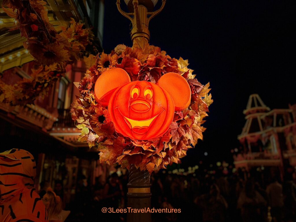 The Magic Kingdom is lit up beautifully at night during the Halloween Season, including during Mickey's Not-So-Scary Halloween Party.