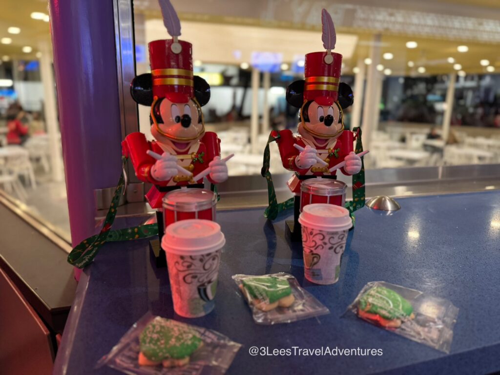 3 Lee's Travel Adventures enjoyed checking out the Holiday Treat Location for Cookies and Cocoa. We also got a bite to eat and these cute Mickey Mouse Drummer Boy Sippers from Cosmic Ray's Starlight Café.
