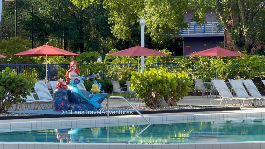 "The Little Mermaid" watches over Guests in the Piano Pool at Disney's All-Star Music Resort.