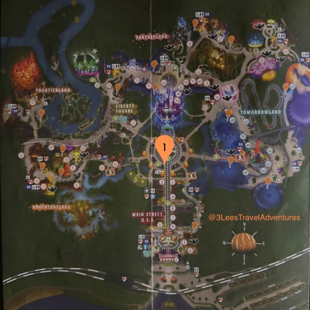 3 Lee's Travel Adventures watched Mickey's "Boo-to-You" Halloween Parade from near the Partners Statue in 2023.