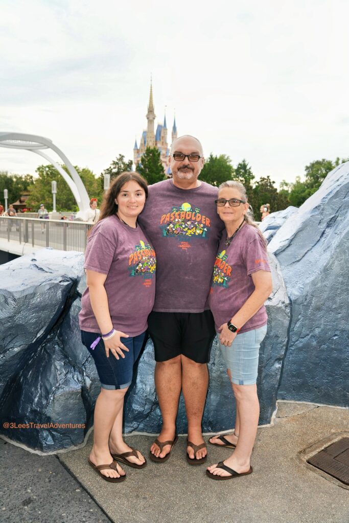 Just across the Tomorrowland Bridge in the Magic Kingdom is a Great Spot where you can get a picture with Cinderella's Castle and have less people in the background.