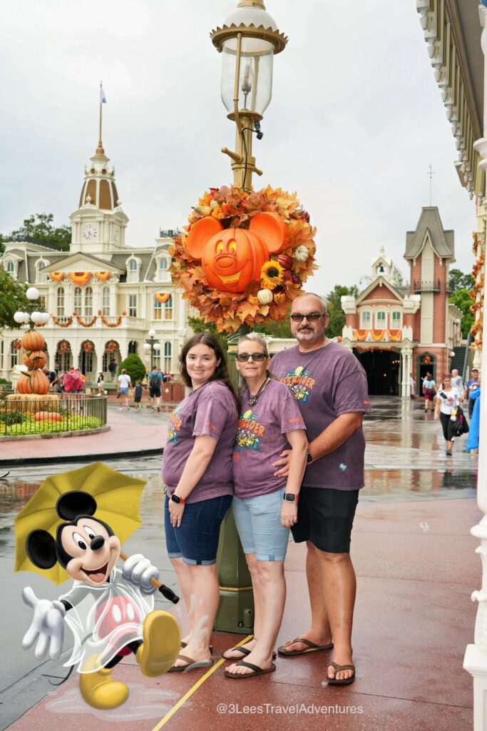 A little Rain didn't slow us down. In fact, it gave us the rare opportunity to get a picture taken by one of the talented Disney Photopass Photographers with the Mickey Pumpkin Wreath. We even got the added magic of Mickey Mouse in his Rain Gear.