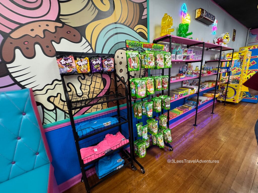 Smiling Scoops has some Cute Merchandise and a Large Selection of Candy. Pictured is the Selection available on September 21, 2025. Plus, they have PAC-MAN!!!