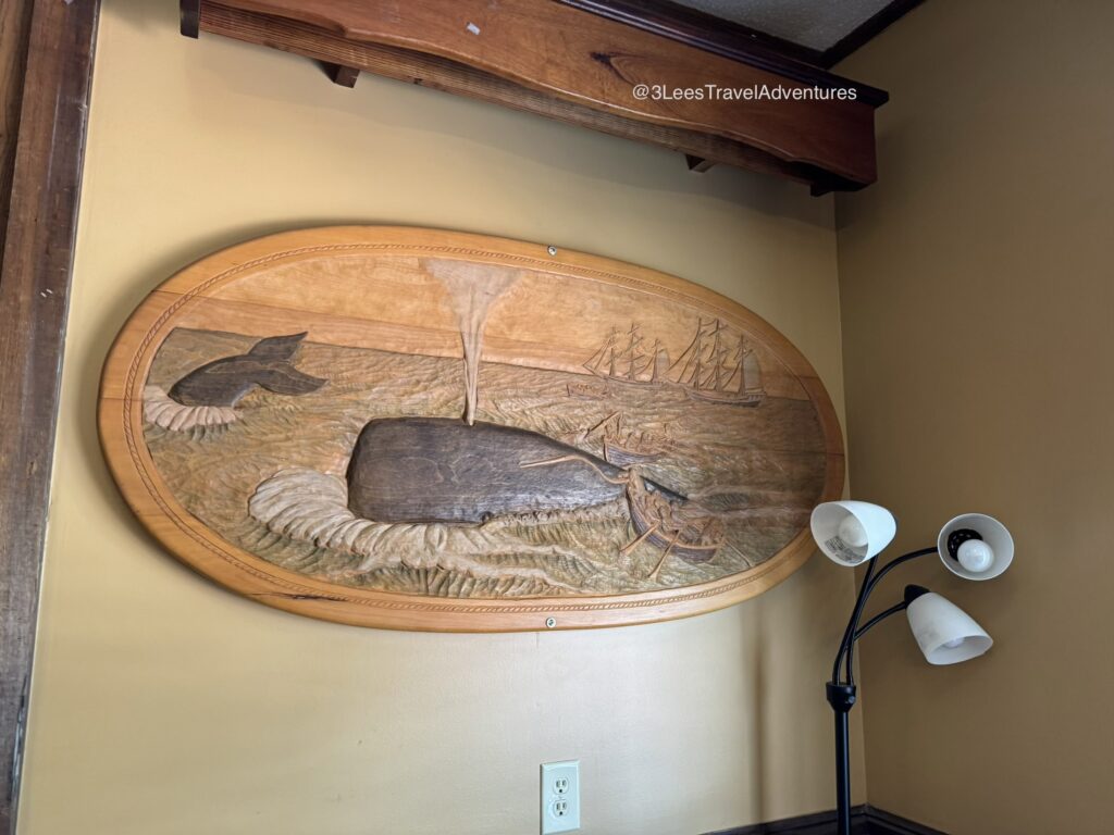 We, 3 Lee's Travel Adventures, always find something new to look at in Judy Boone's. On our July 12, 2025 trip, It was this neat wood carved picture of Whales and Boats.